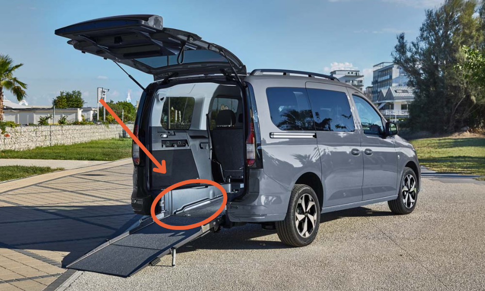 Wheelchair-accessible vehicle with lowered-floor ramp and integrated lighting system for enhanced safety